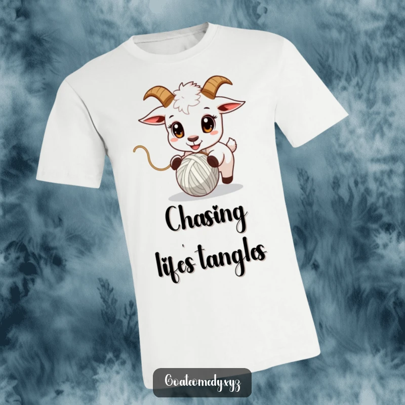 Funny goat t-shirt showcasing a goat with wide, eager eyes intently chasing a bouncing ball of yarn.